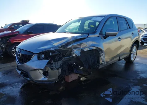 2013 Mazda Cx-5 Grand Touring z USA, uszkodzony, nr VIN JM3KE4DE8D0156887